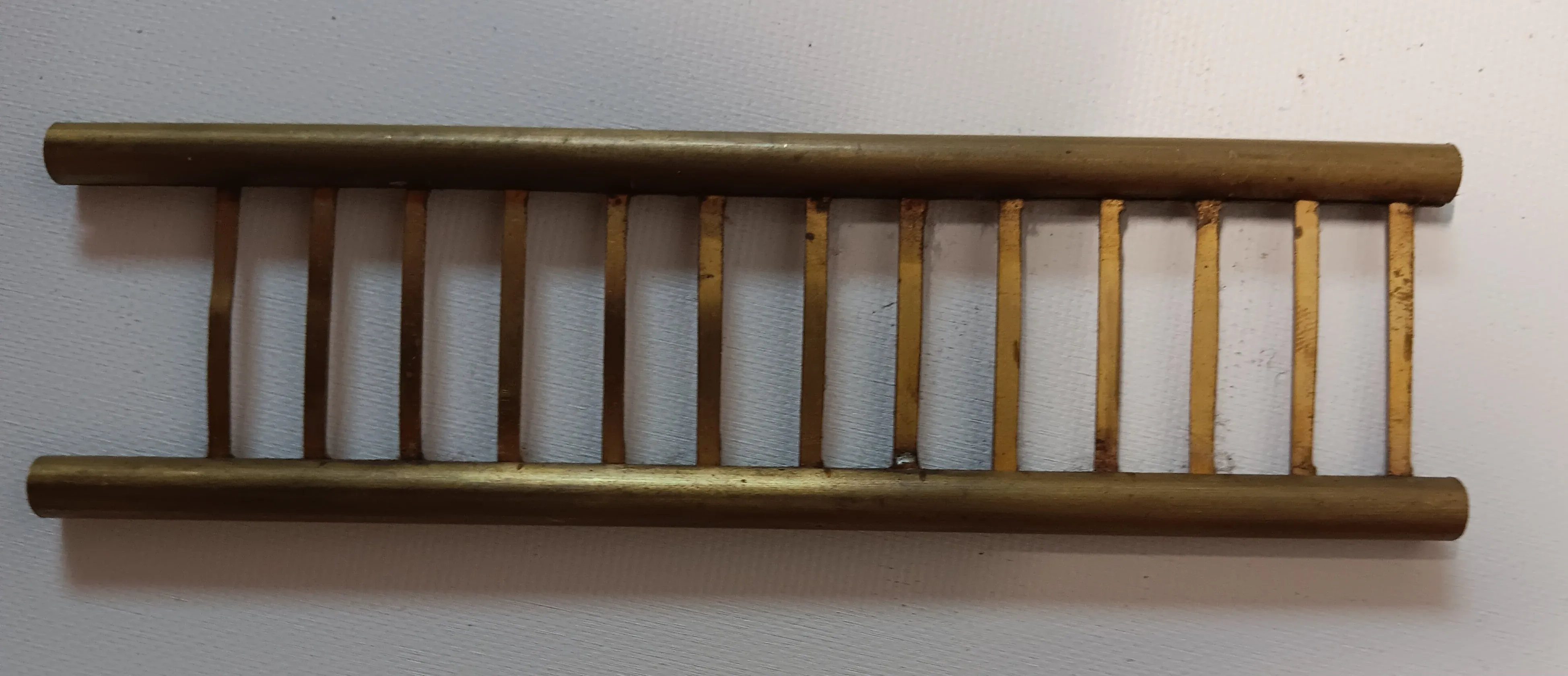 6-1/4" brass vintage toy ladder.  1-3/4" wide.